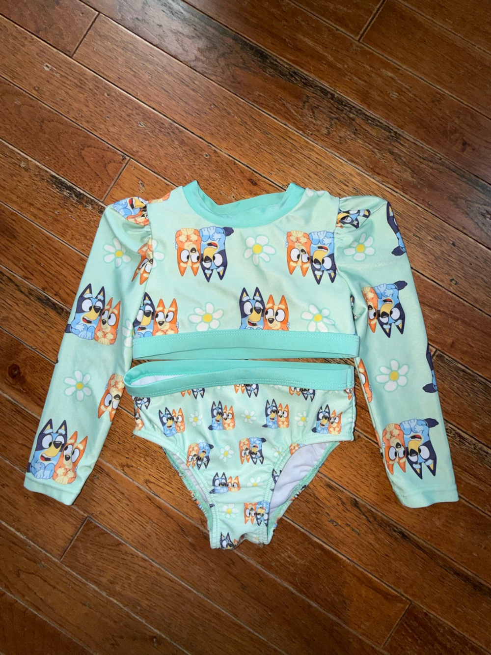 Mint Green Long-Sleeve Kids Swim Bodysuit with Playful Cartoon Print
